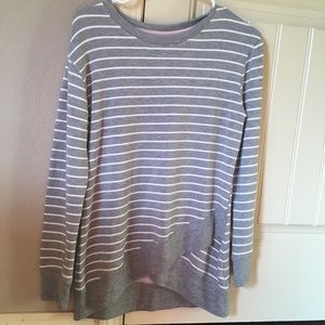 grey white striped long sleeved shirt